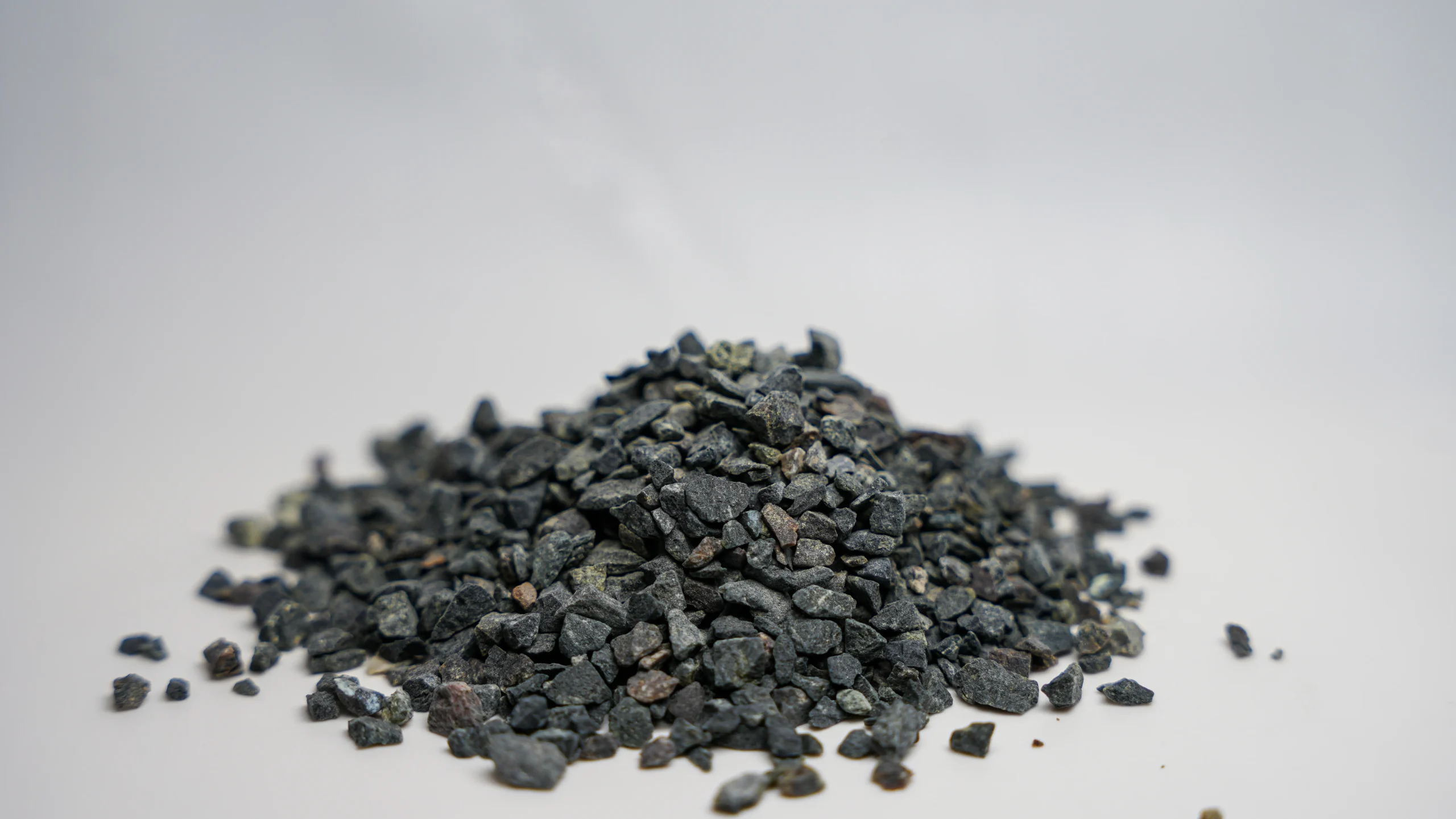 a pile of small black rocks