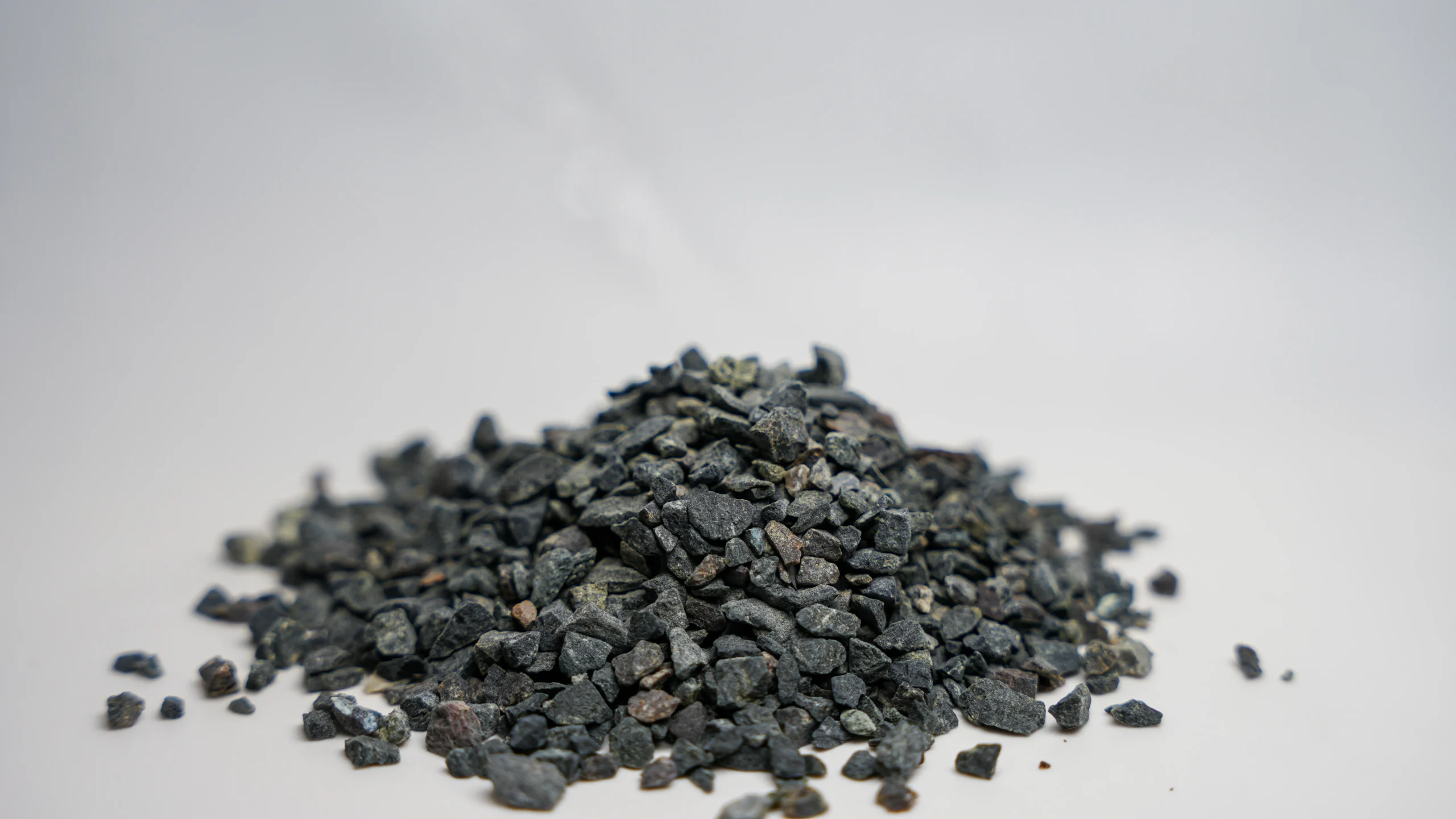 a pile of small black rocks