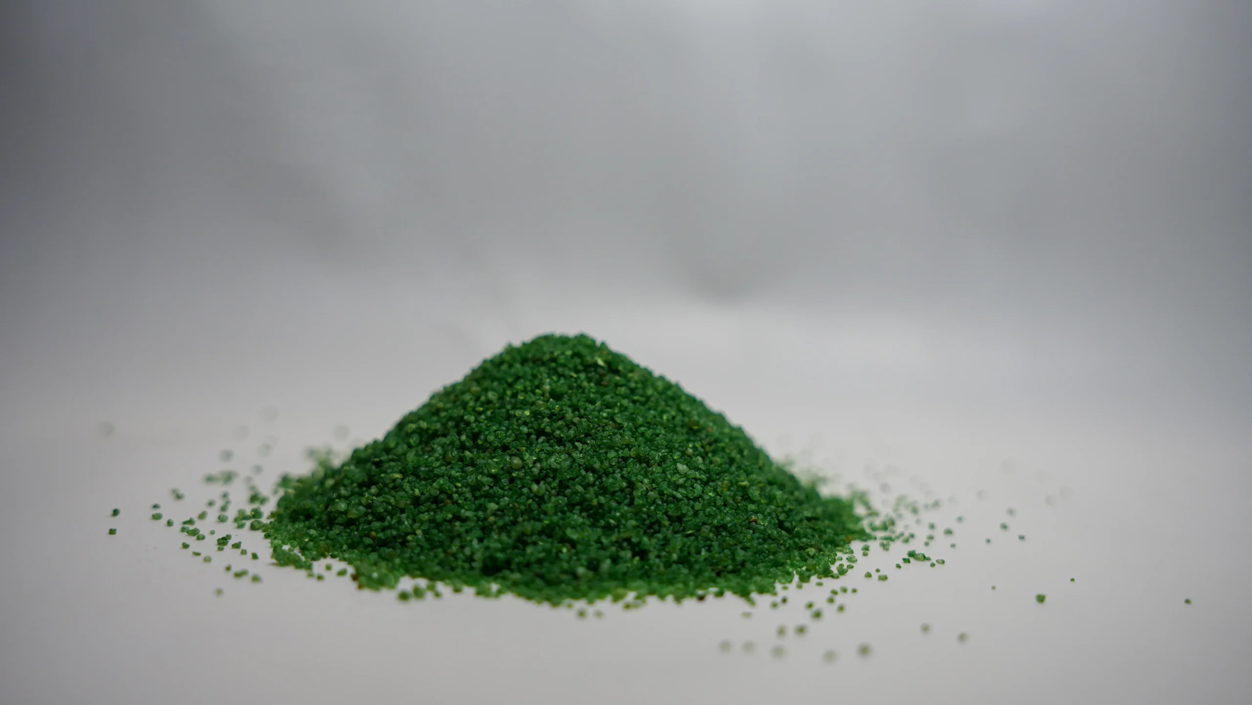A pile of green powder sits