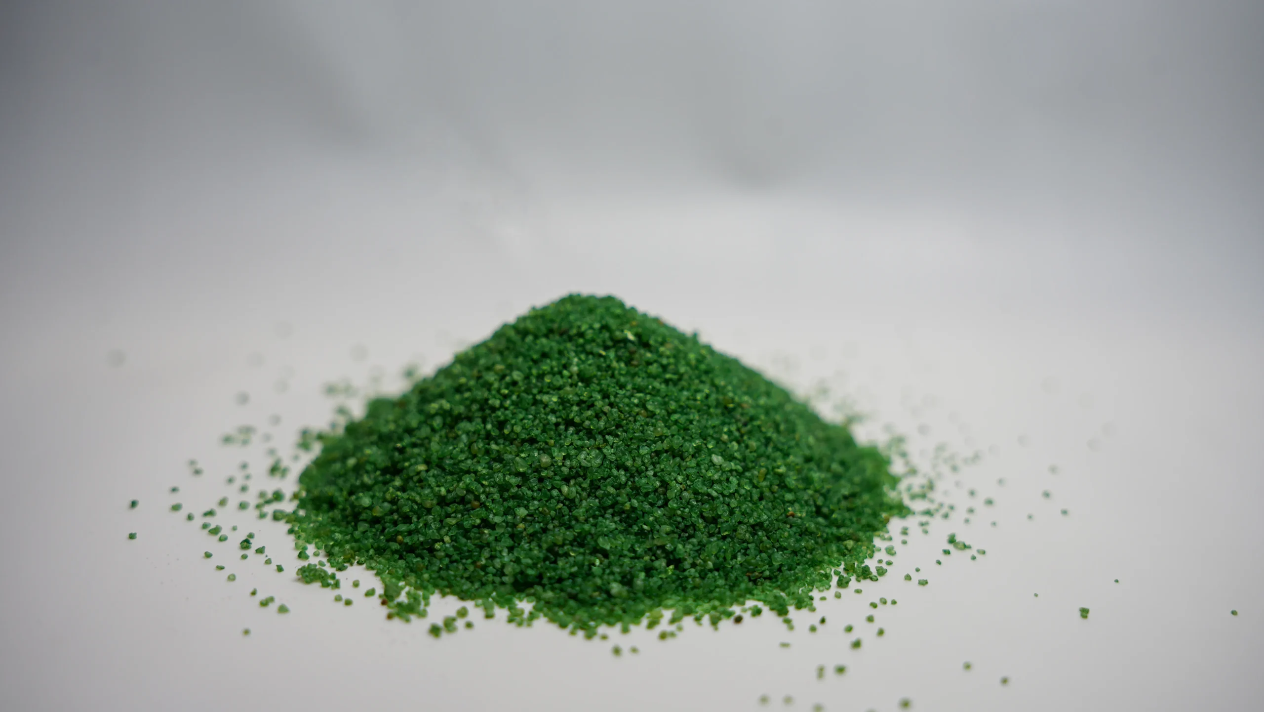 A pile of green powder sits