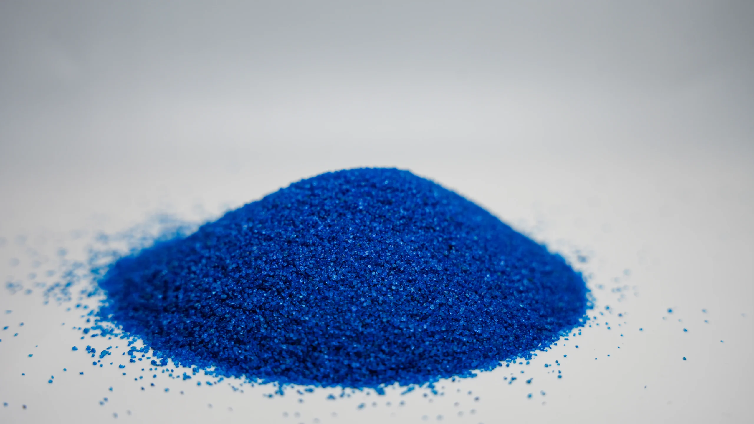 A small mound of blue sand