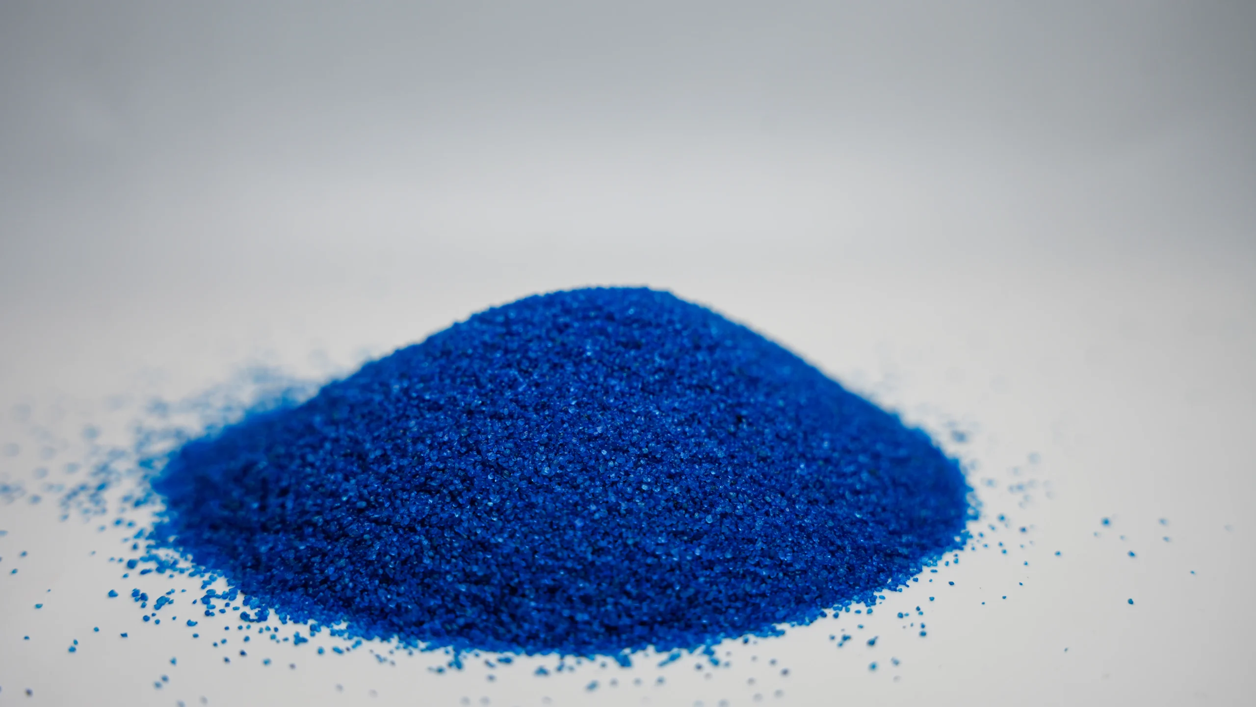 A small mound of blue sand