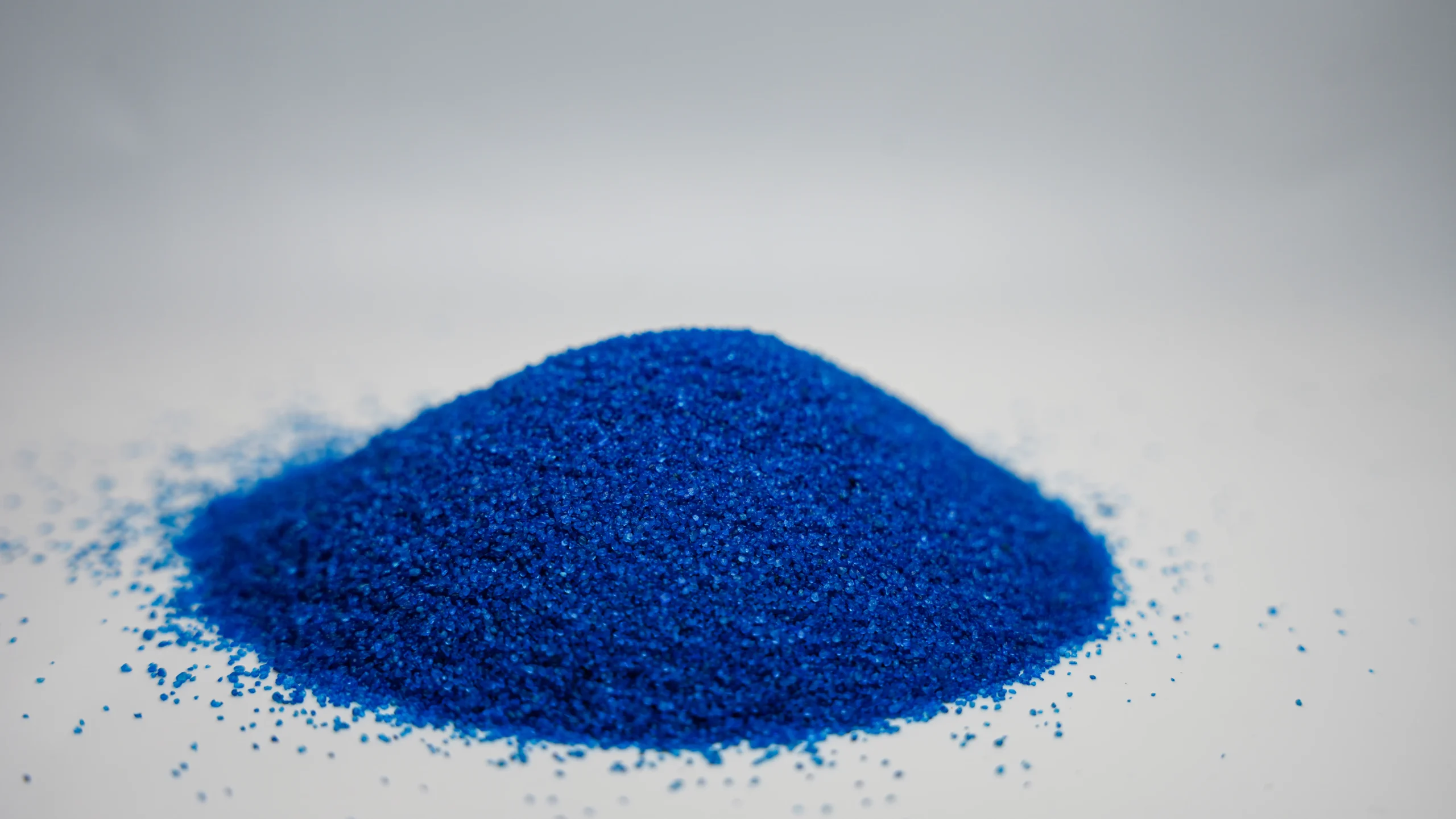 A small mound of bue sand