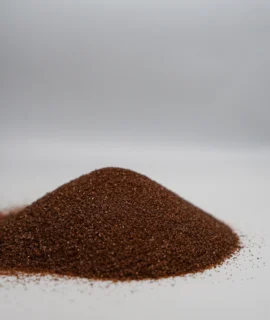 A small mound of fine brown sand