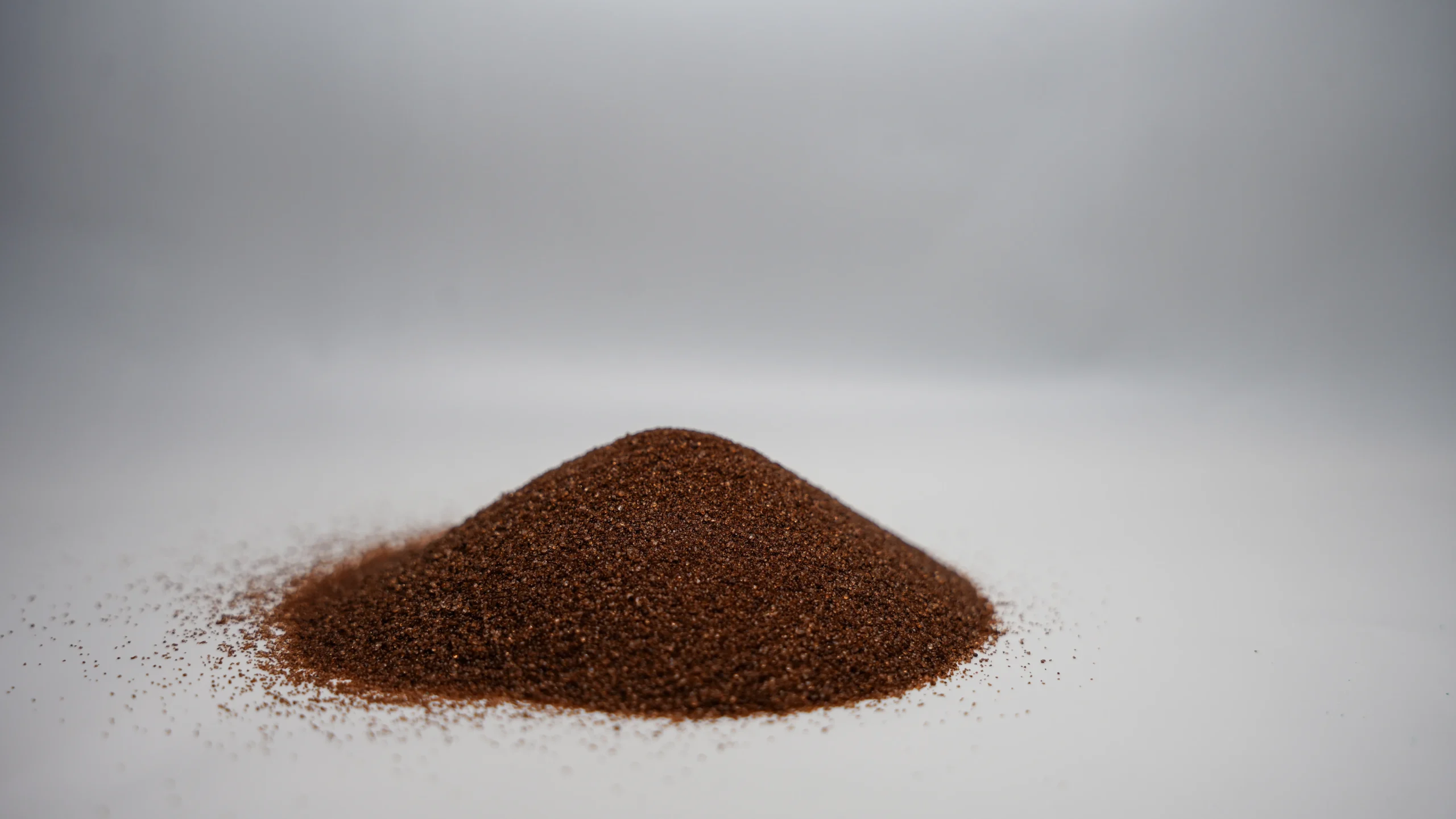 A small mound of fine brown sand