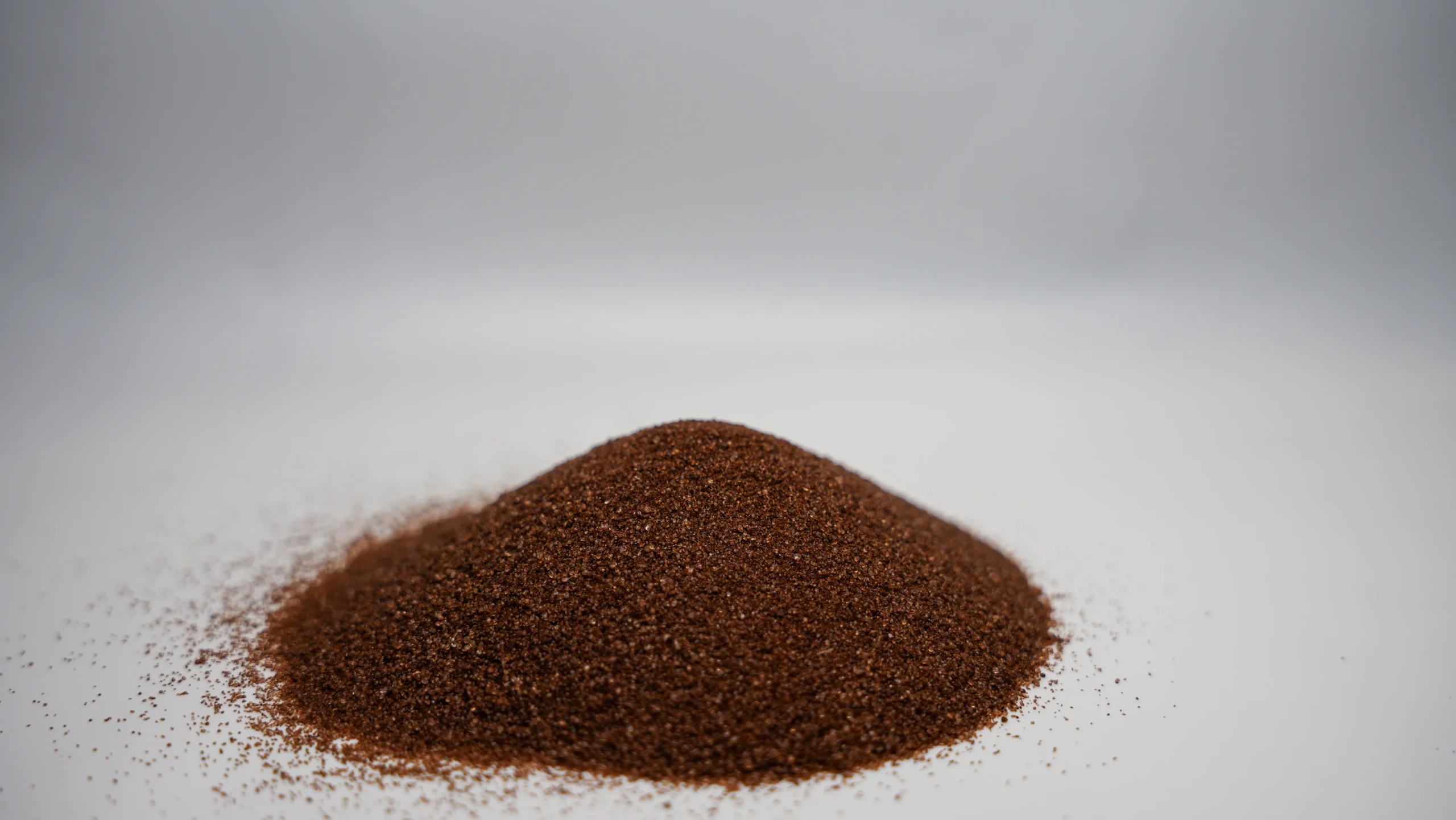 A small mound of fine brown sand
