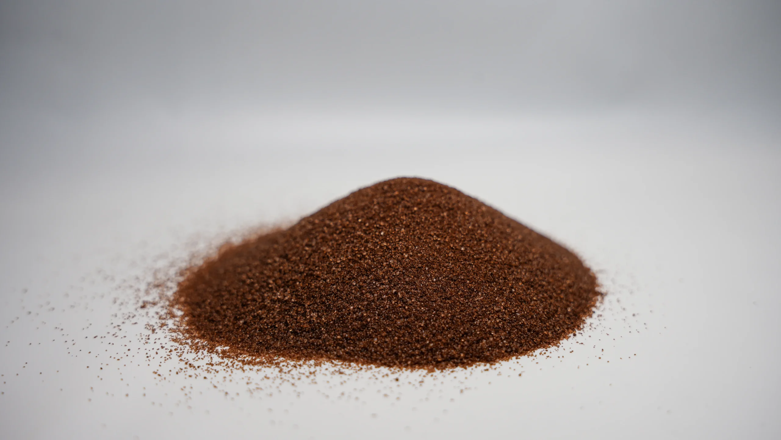 A small mound of fine brown sand