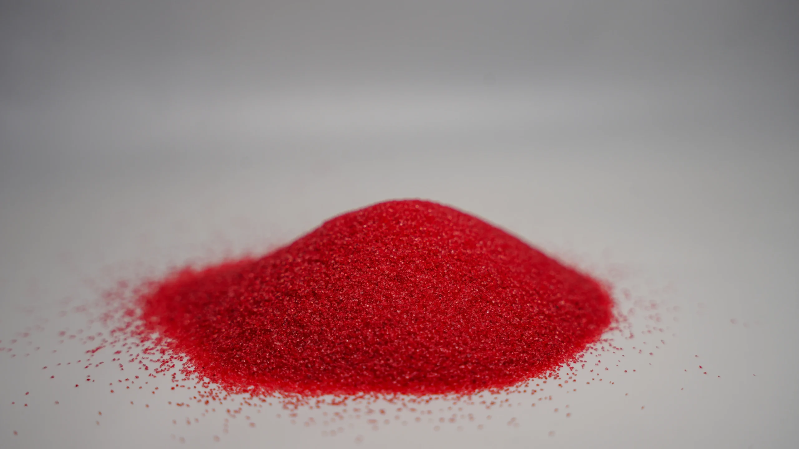 A small mound of fine Pink sand