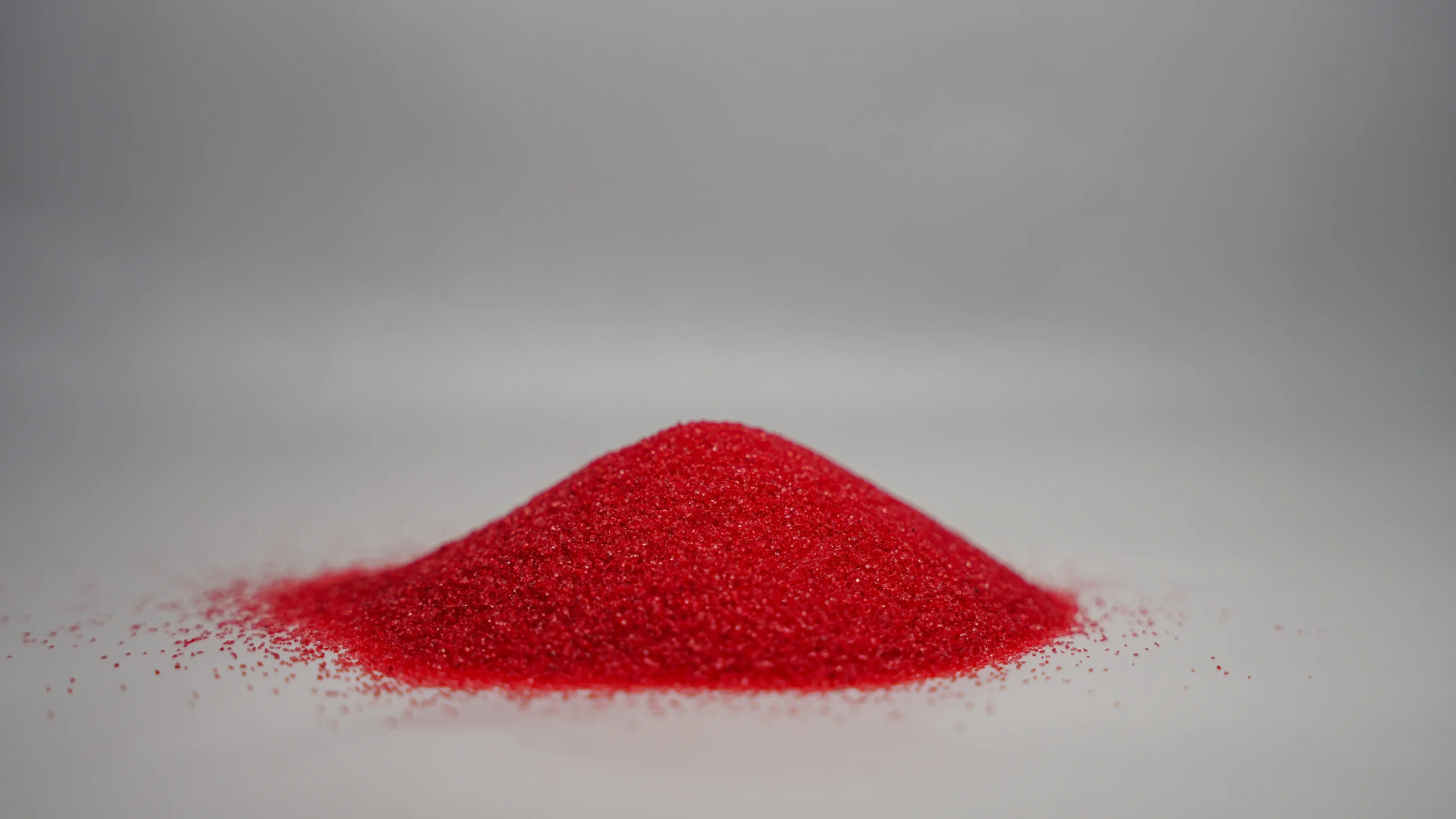 A small mound of fine Pink sand