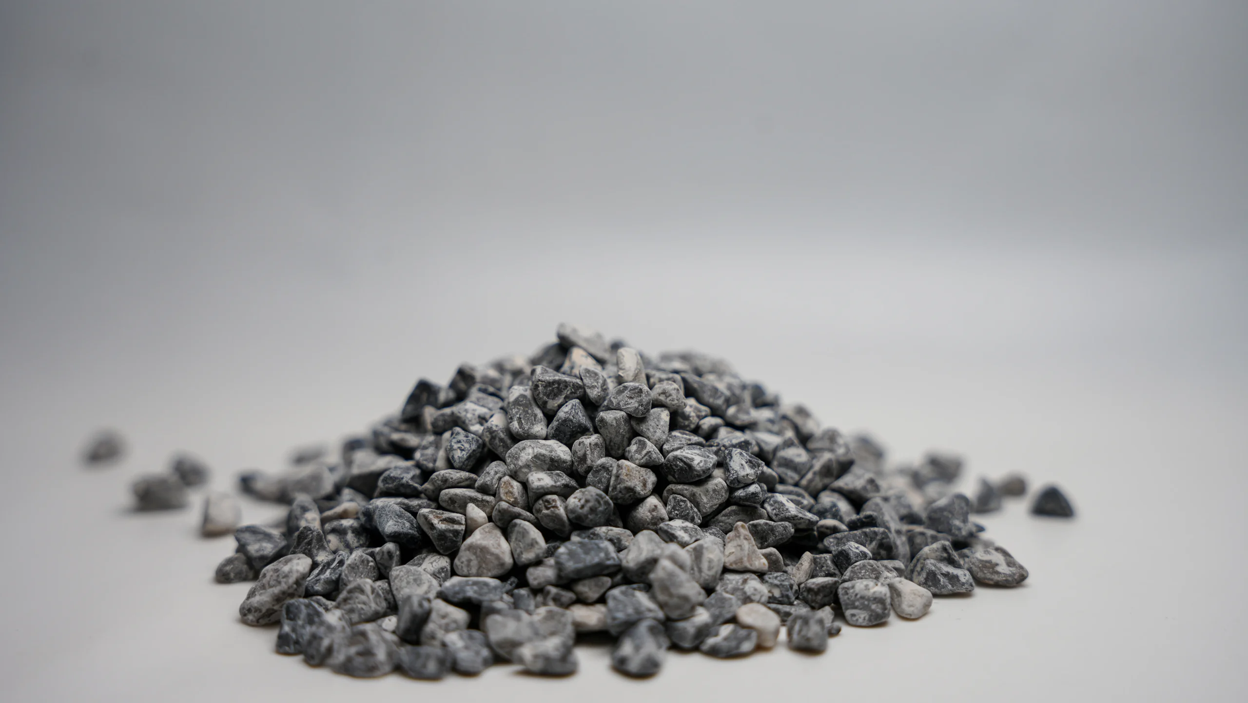 a pile of small black rocks