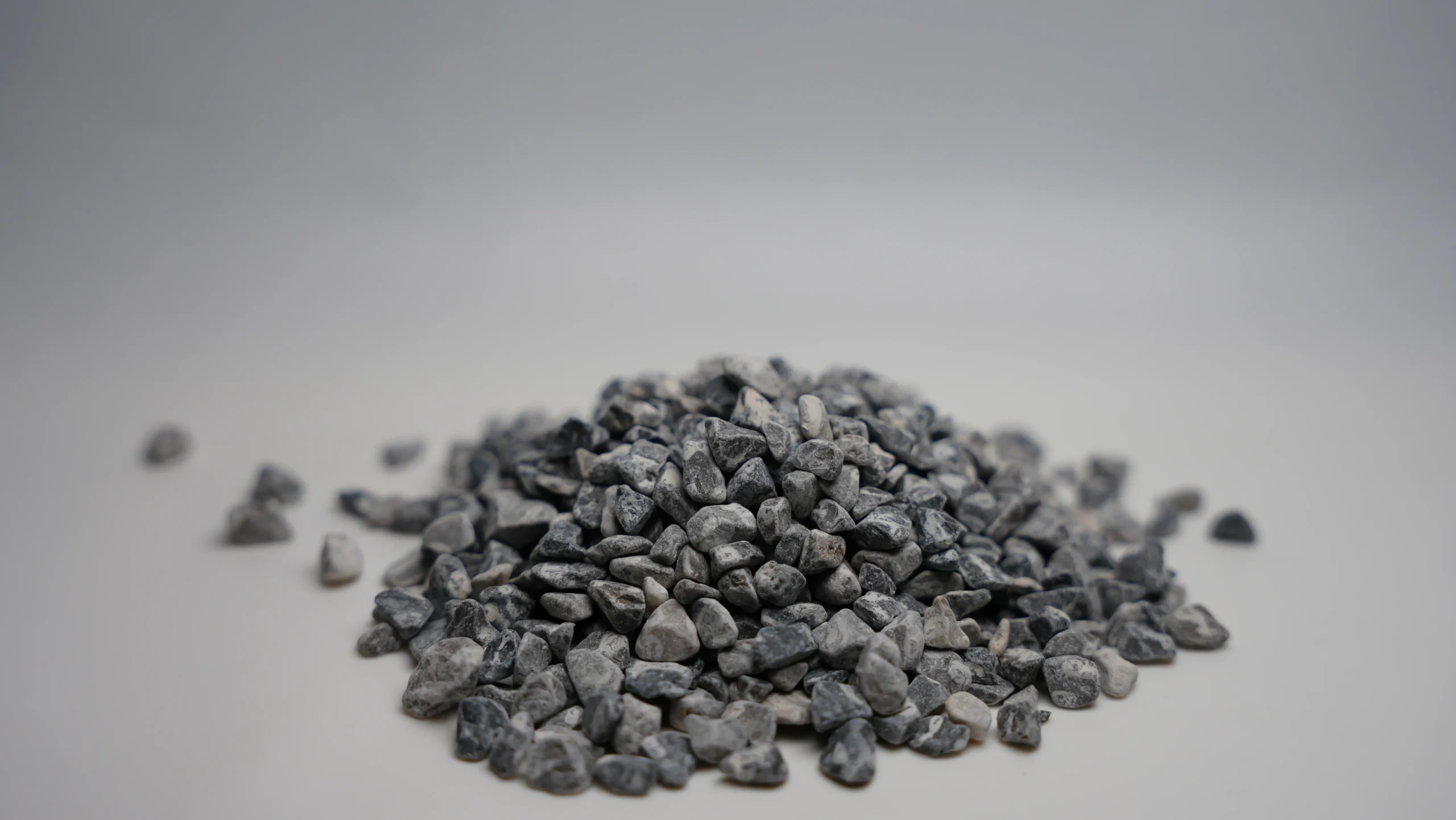 a pile of small black rocks