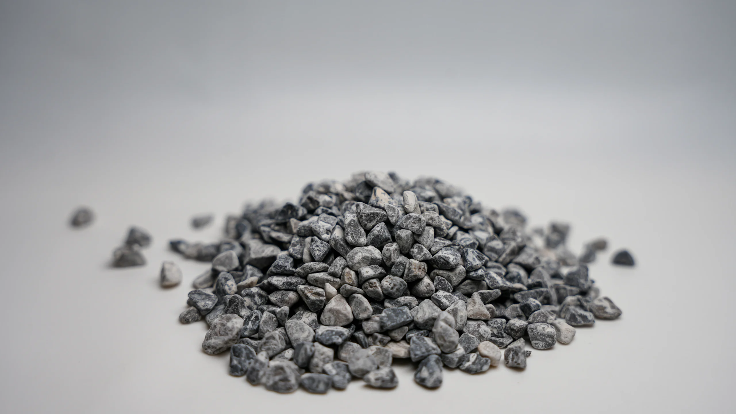 a pile of small black rocks